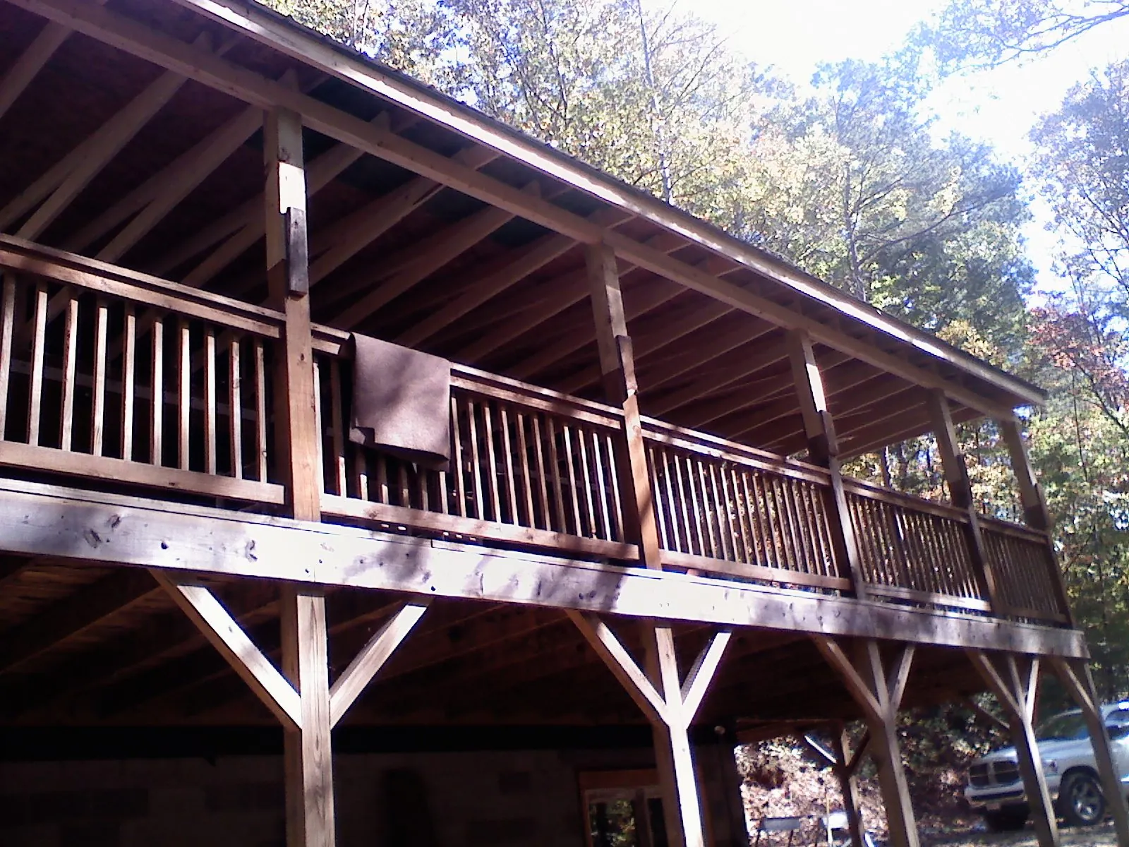 Timber framing under a new elevated porch and deck — Roof Leak Repair in Los Angeles by Roofing Brothers